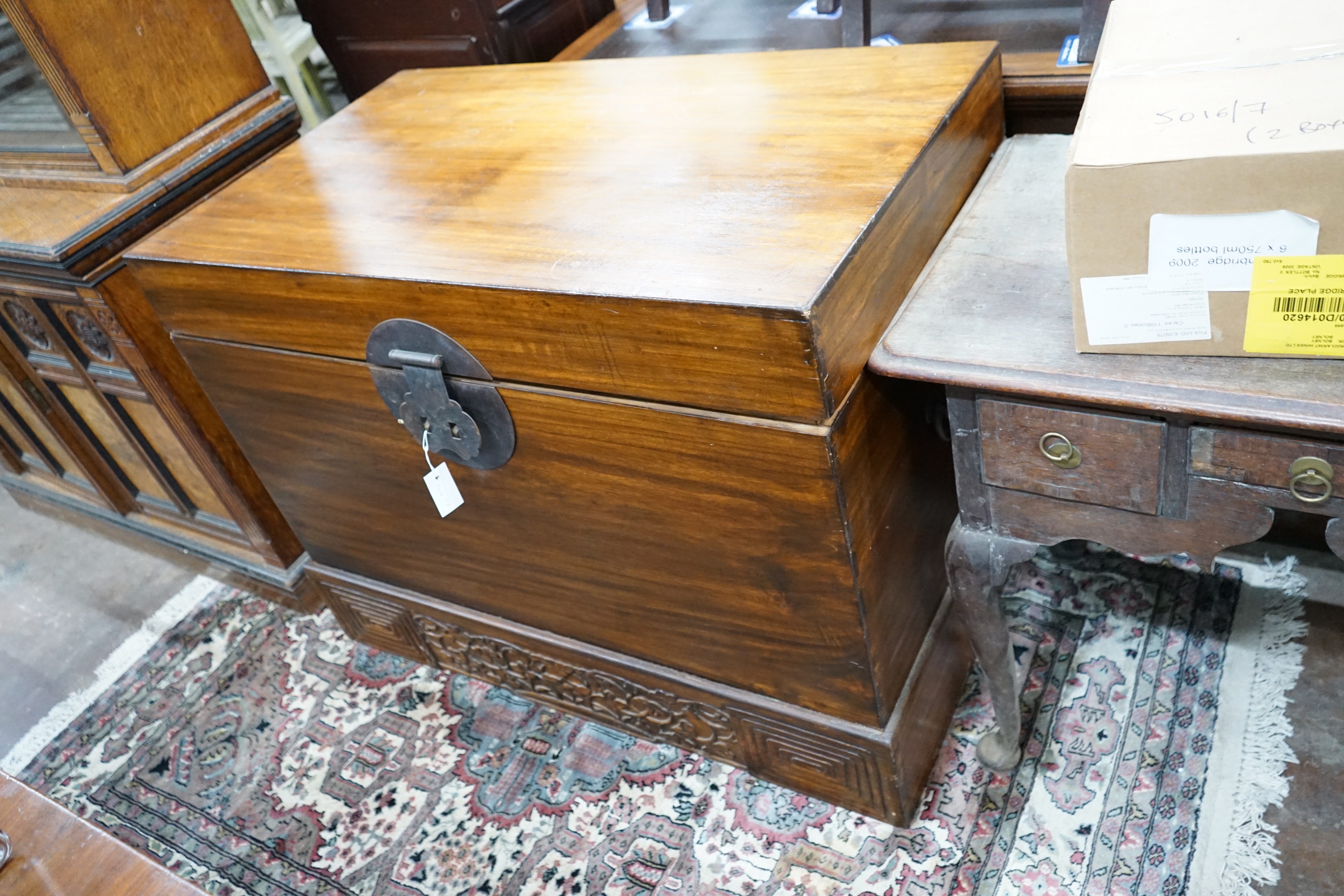 A Chinese carved hardwood coffer, width 105cm depth 63cm height 82cm